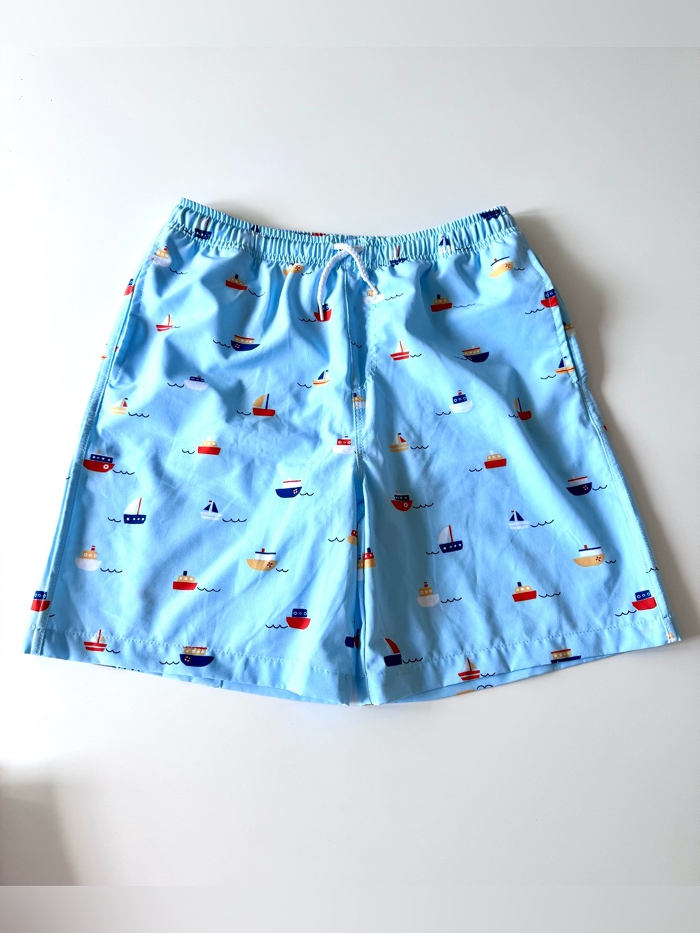 Millie & Maxx Boys’ Light Blue Boat Print Swim Trunks, size 12